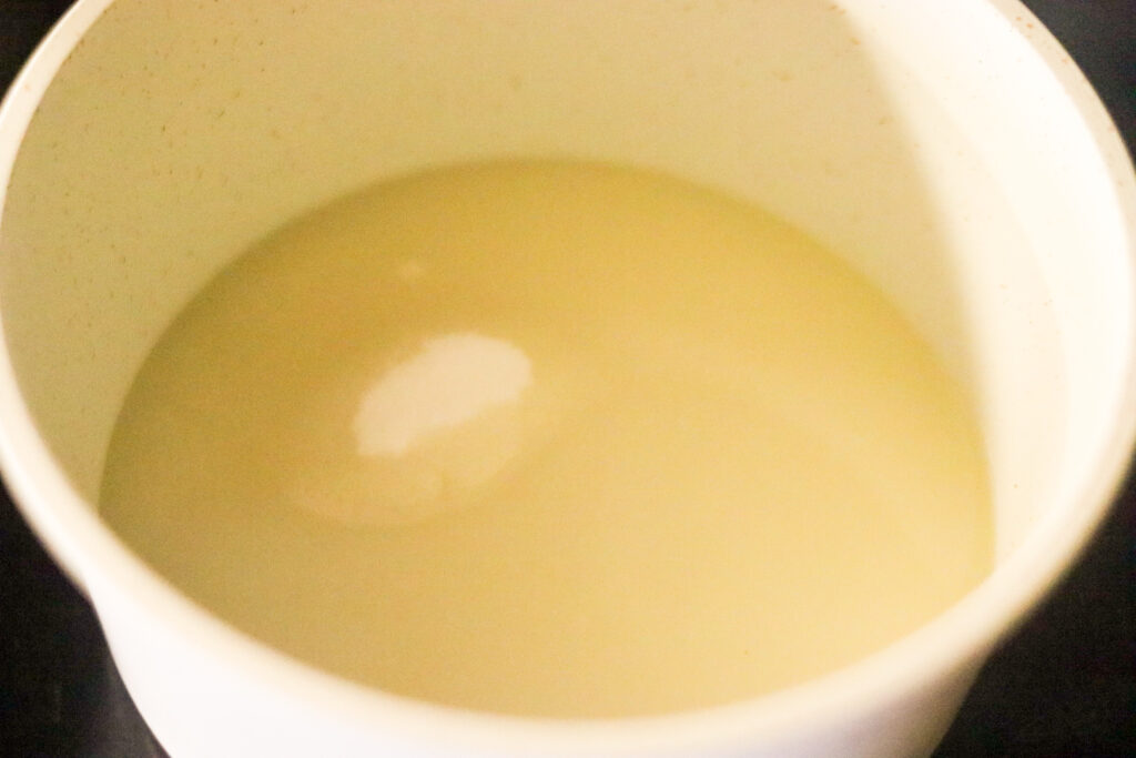 combining the ingredients in a double bolier on a stove