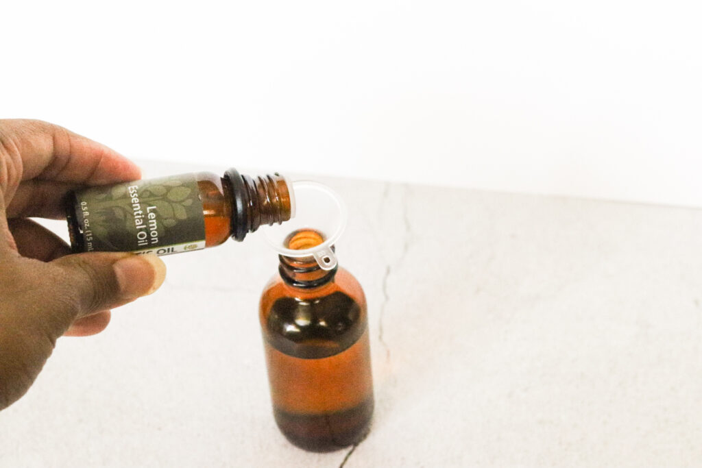 pouring essential oils in freshener spray