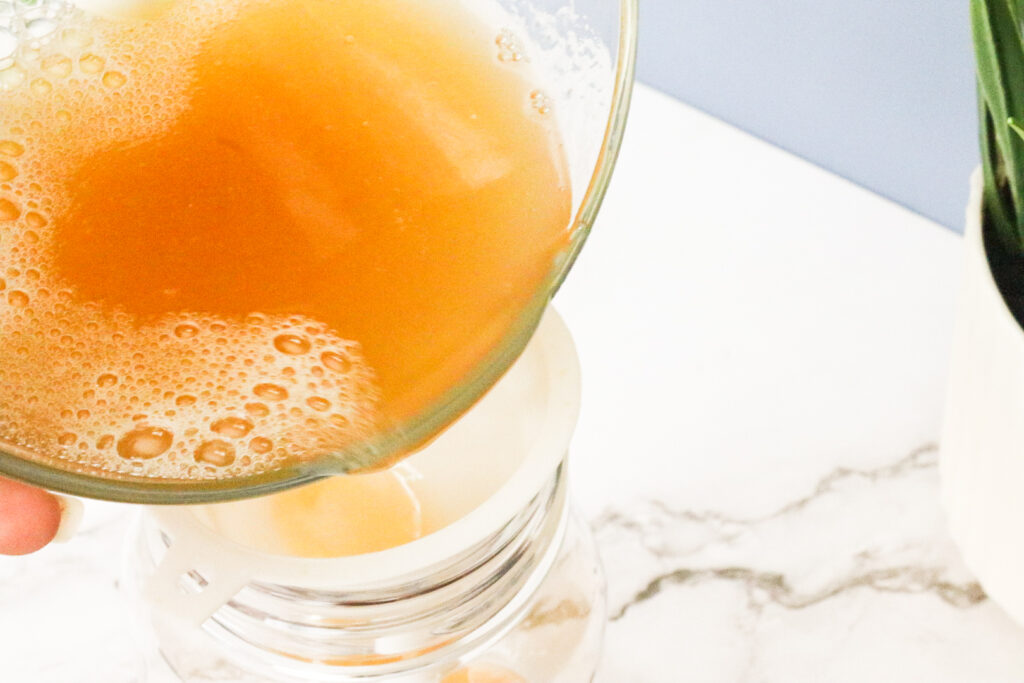 pouring ingredients into pump bottle